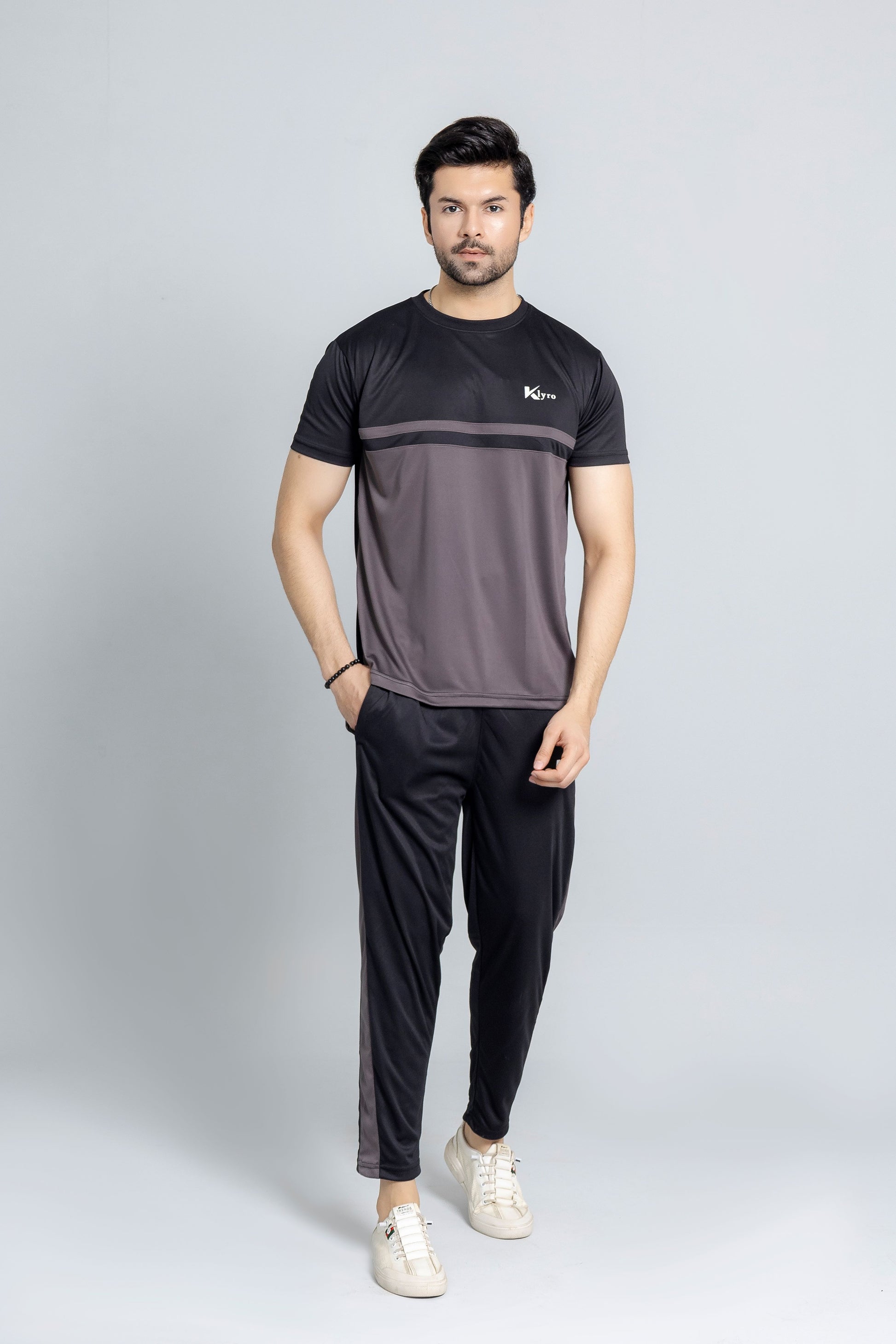 "CoalCore tracksuit back view soft touch fabric KLYRO"