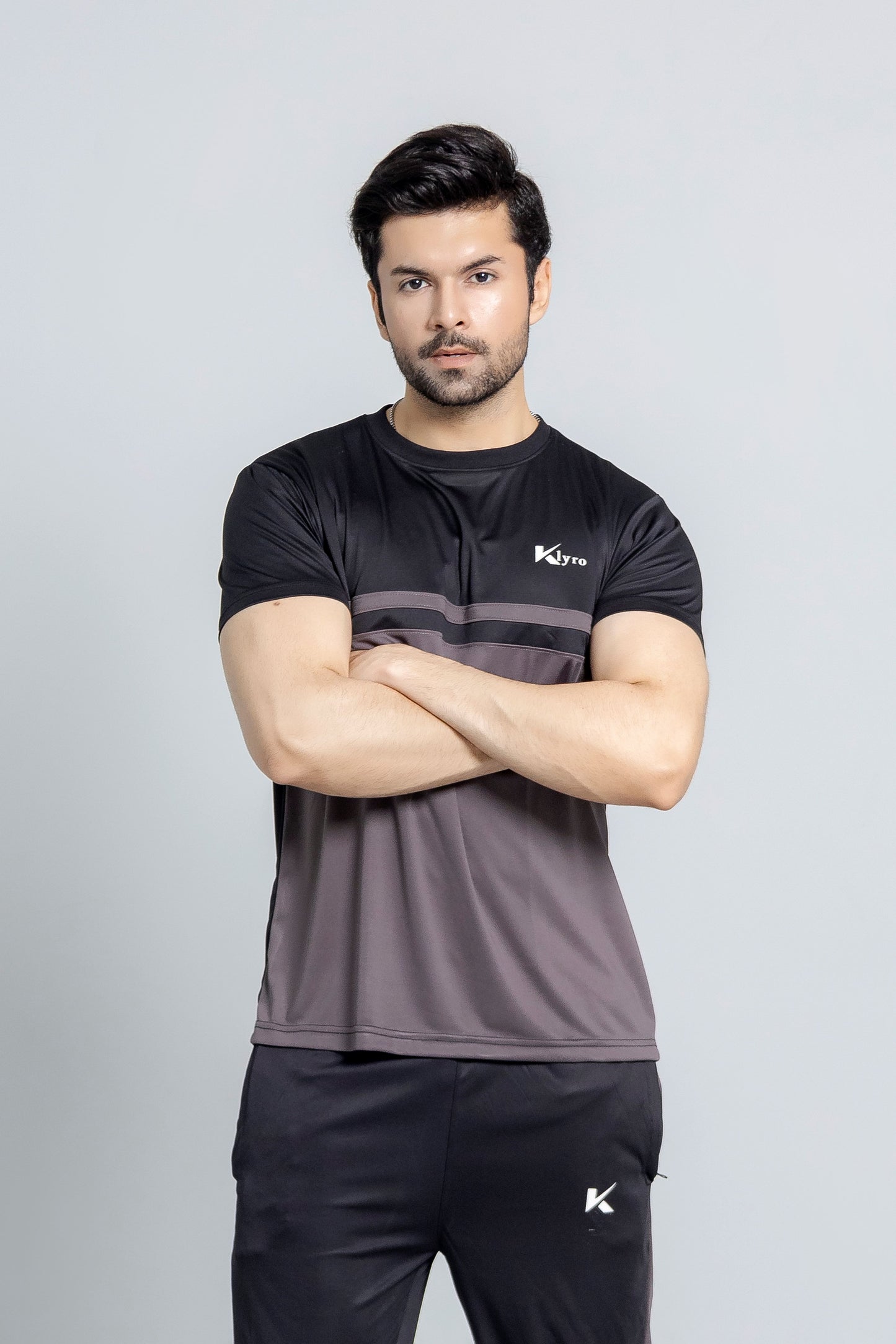 "CoalCore tracksuit side view slim comfort fit KLYRO"