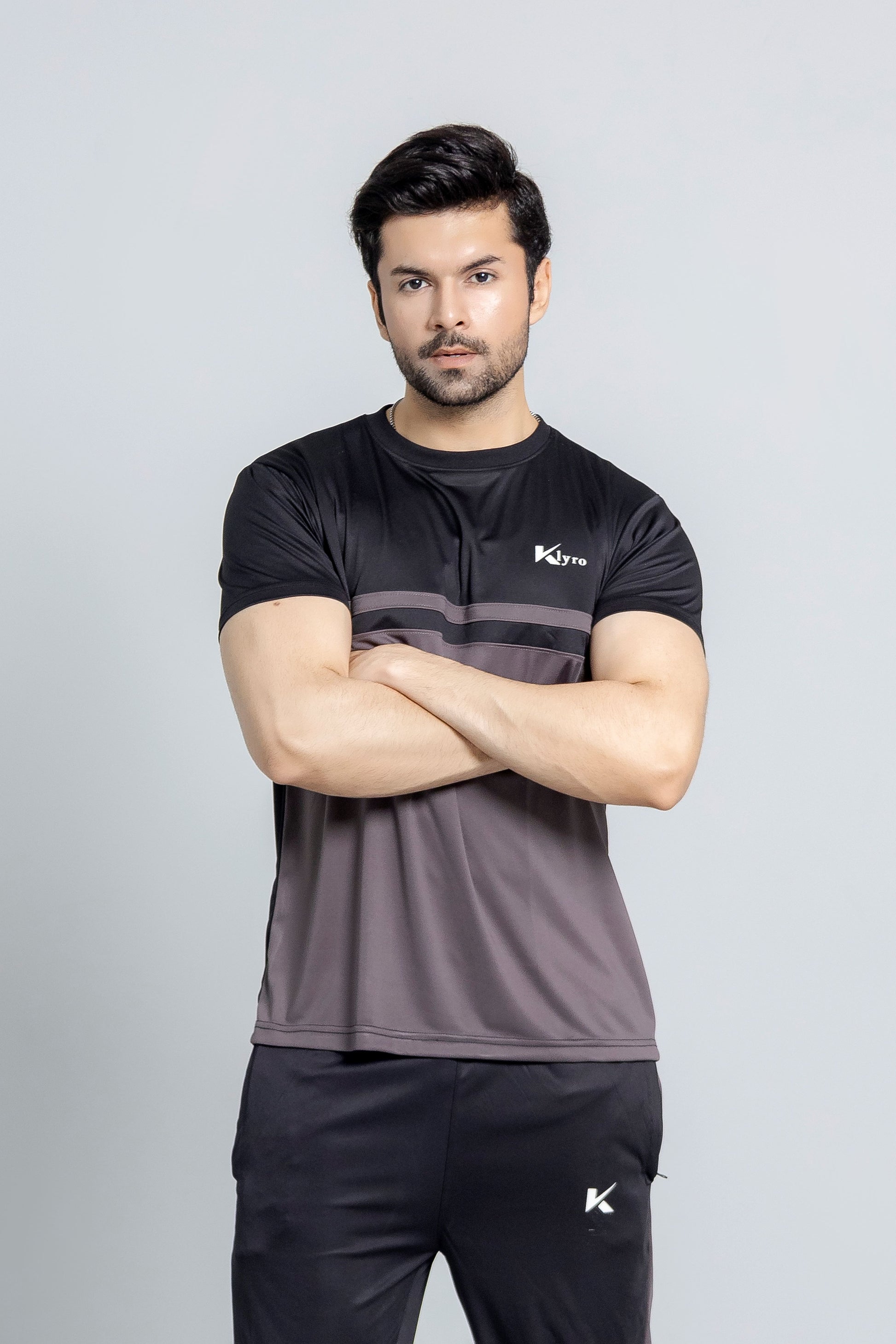 "CoalCore tracksuit side view slim comfort fit KLYRO"