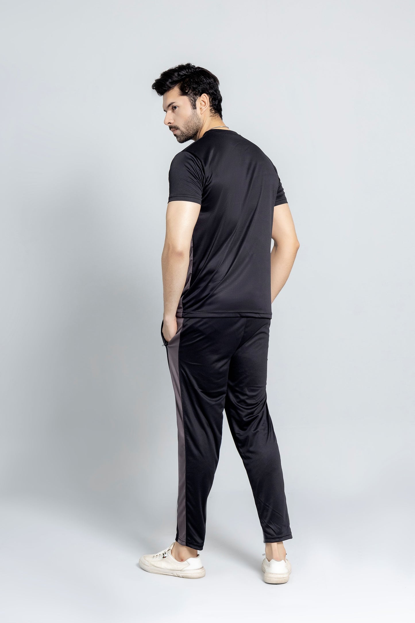 "CoalCore tracksuit front view men's performance wear KLYRO"