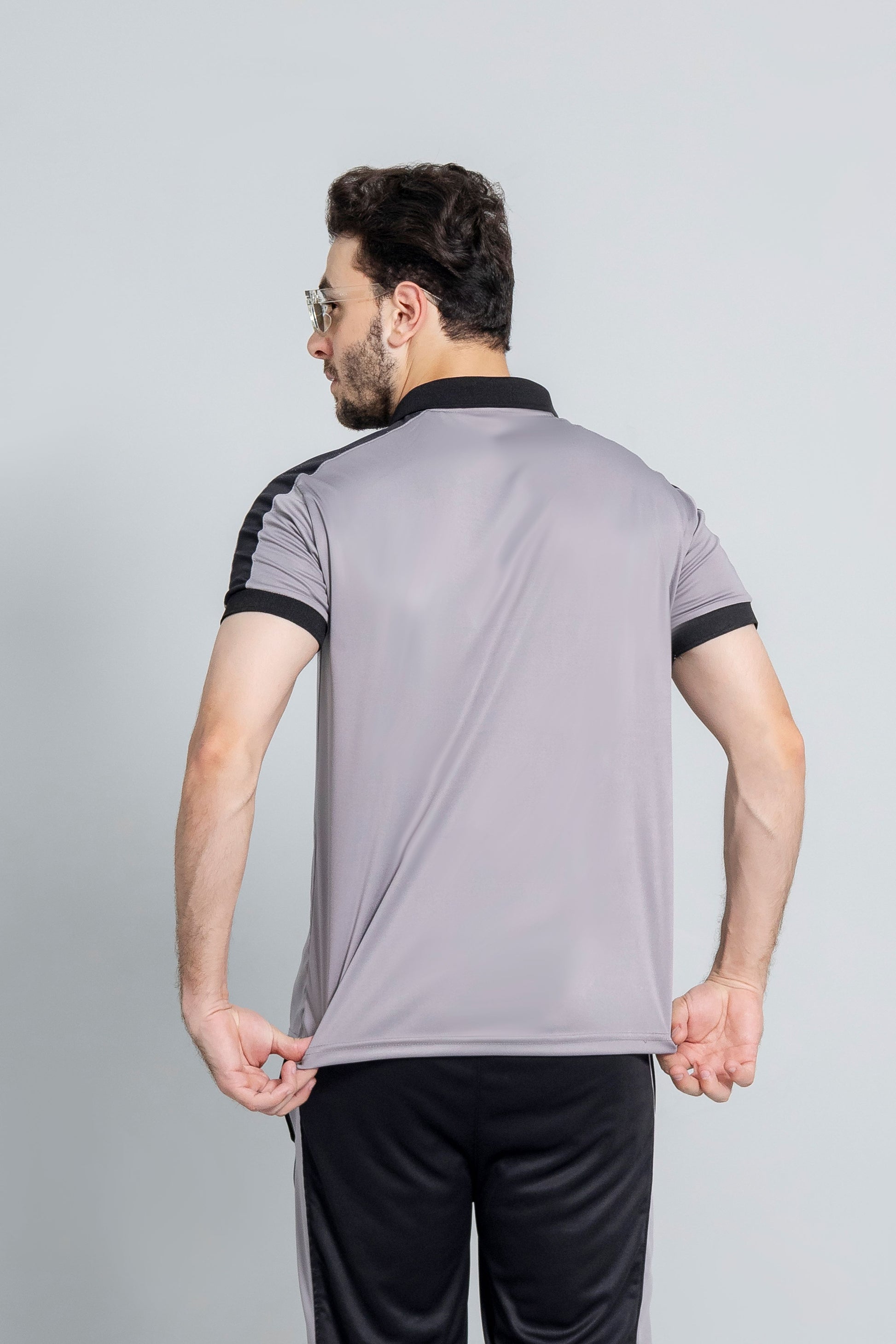 Athletics summer tracksuit back view breathable fabric KLYRO*4. "Athletics summer tracksuit side view slim fit KLYRO"