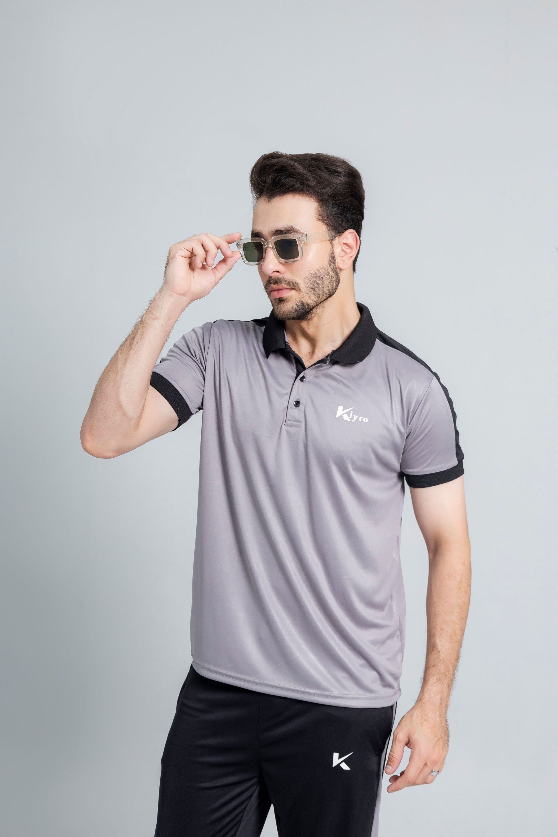 Athletics summer tracksuit close up fabric detail KLYRO*6. "Athletics summer activewear full outfit streetwear Pakistan KLYRO"---